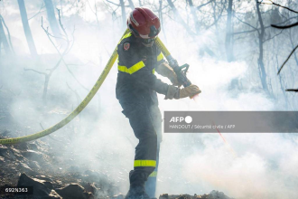 French firefighters optimistic after controlling vast wildfire